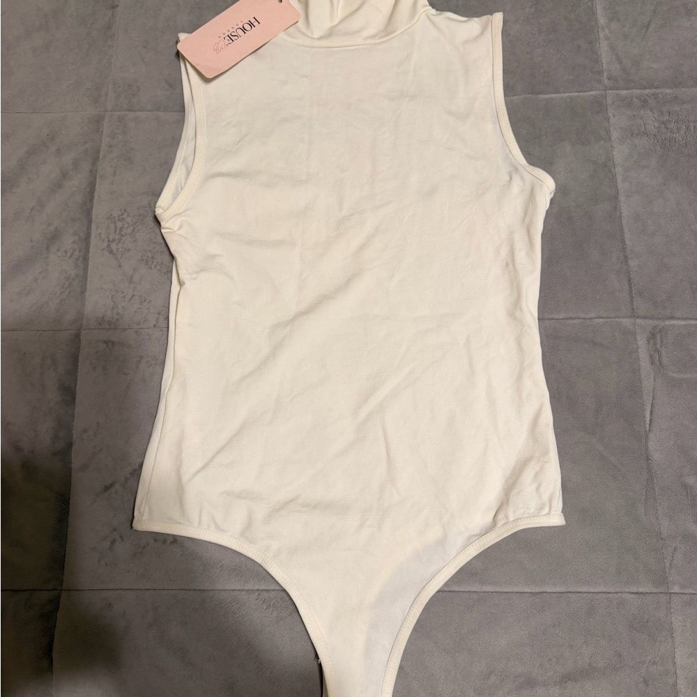 House of CB Cream Sleeveless Turtleneck Bodysuit - Picture 1 of 3
